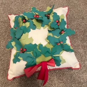 Grandin road wreath indoor/outdoor pillow. Some fading of colors.